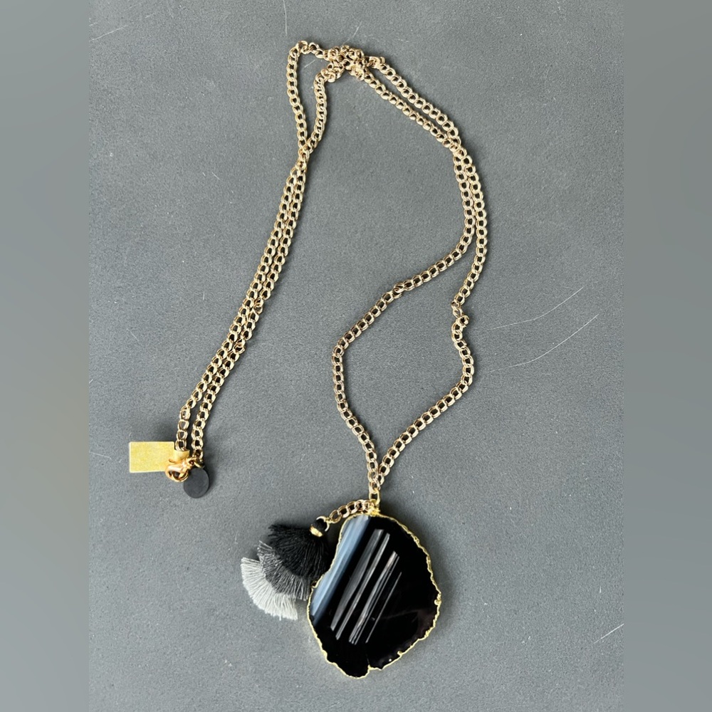 Stone and tassel necklace